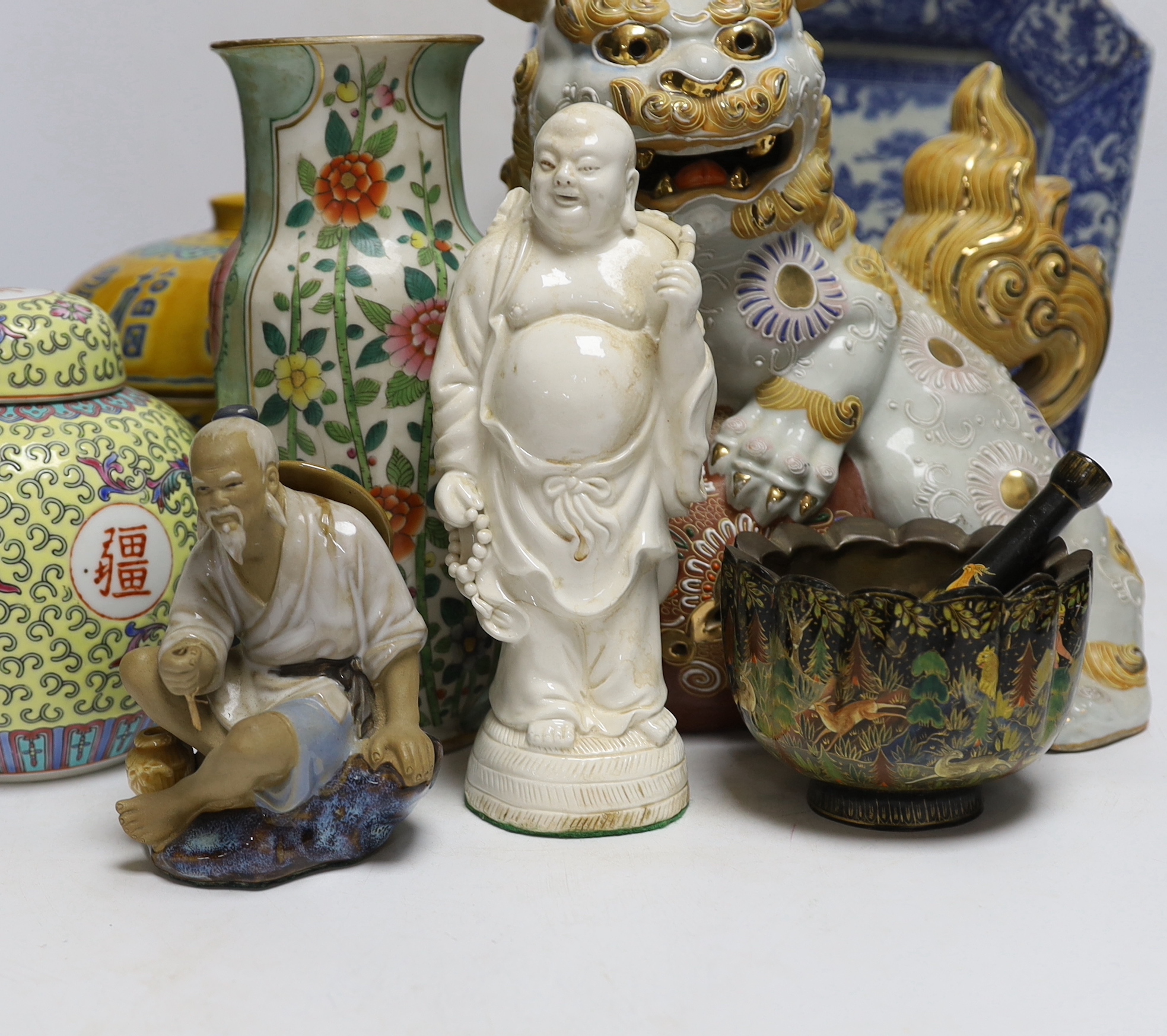 A collection of mostly Chinese ceramics, to include a vase, a lion dog, etc. blue and white dish 26cm square